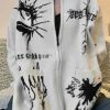Style Core Aesthetics, New Style Trends - Cardigan en tricot à grandes poches et imprimé différent